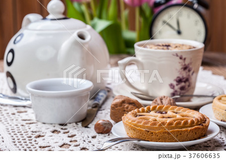 Tasty chocolate walnut tart. 37606635