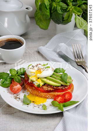 Egg poached on a toasted 37607145