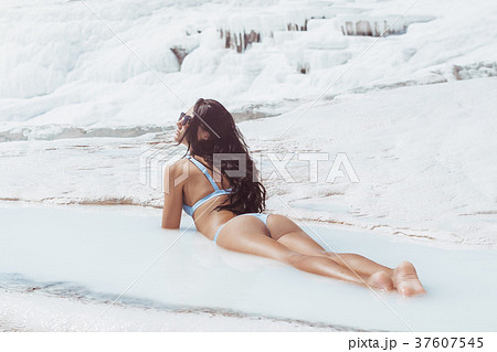 Tourist woman model in swimsuit in Pamukkale 37607545