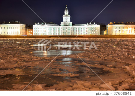 Embankment and frozen Neva River at night. Embankment and frozen Neva River at night. 37608841