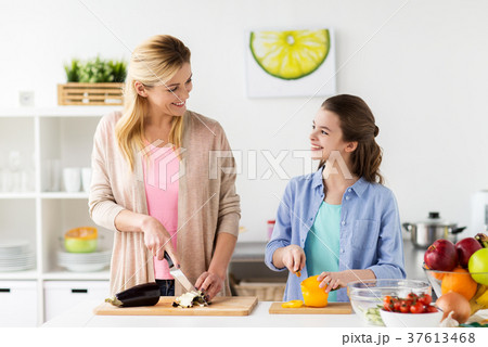 happy family cooking dinner at home kitchen 37613468