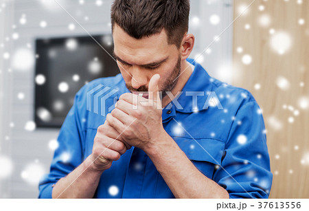 auto mechanic lighting up or smoking cigarette auto mechanic lighting up or smoking cigarette 37613556