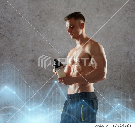 young man or bodybuilder with protein shake bottle 37614238