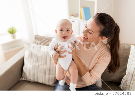 happy mother with little baby boy at home happy mother with little baby boy at home 37614305
