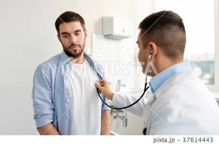 doctor with stethoscope and patient at hospital doctor with stethoscope and patient at hospital 37614443