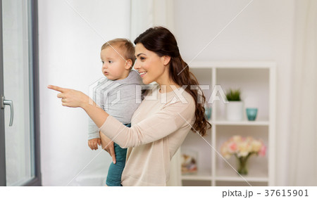 happy mother with little baby boy at home happy mother with little baby boy at home 37615901