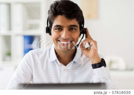 businessman with headset and computer at office 37616030