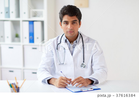 doctor with stethoscope and clipboard at clinic doctor with stethoscope and clipboard at clinic 37616384