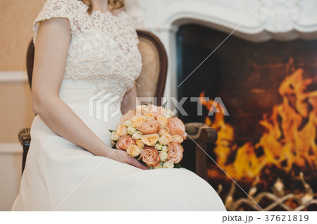 Bouquet of flowers in delicate shades in the women 37621819