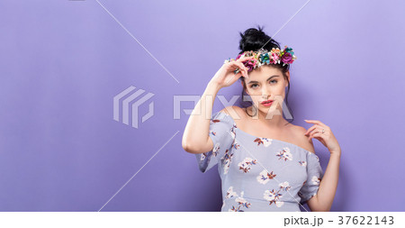 Beautiful young woman with a garland Beautiful young woman with a garland 37622143