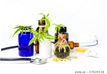 Marijuana oil bottles with leafs and stethoscope 37626538