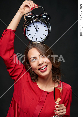 Woman in red shirt and wavy hair Woman in red shirt and wavy hair 37627989