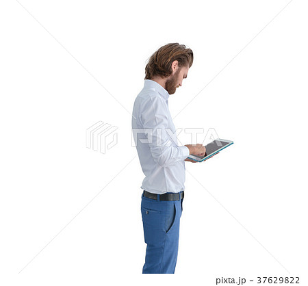 Stressed western businessman using a tablet isolated on white 37629822