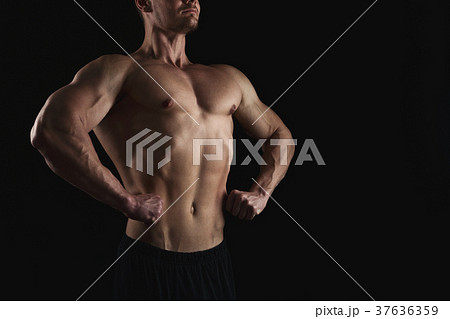 Strong athletic man showes naked muscular body 37636359