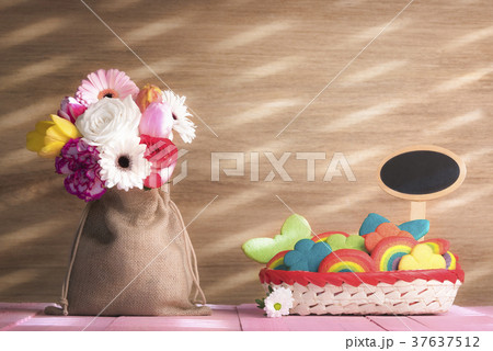 Flowers and colorful cookies with a banner Flowers and colorful cookies with a banner 37637512