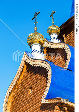 Golden domes with crosses on wooden 37640803