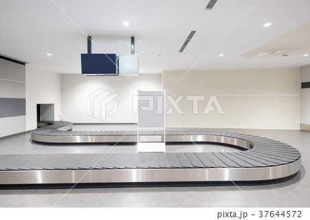 Baggage conveyor belt in airport Baggage conveyor belt in airport 37644572