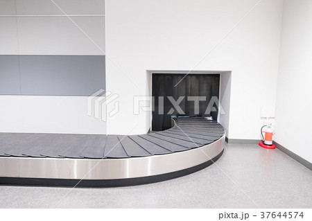 Baggage conveyor belt in airport Baggage conveyor belt in airport 37644574