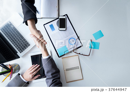 Business partnership handshake for deal business 37644947