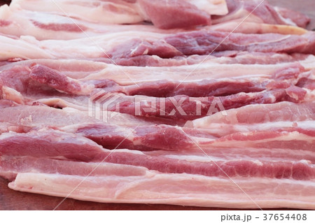 raw pork for cooking in the market. 37654408