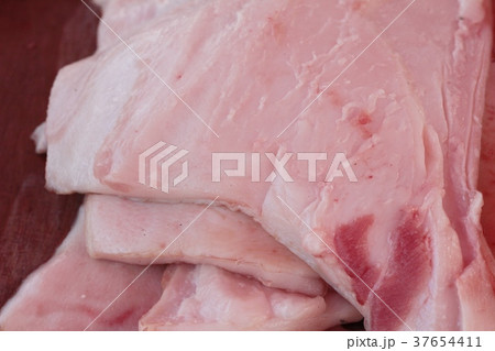 raw pork for cooking in the market. 37654411