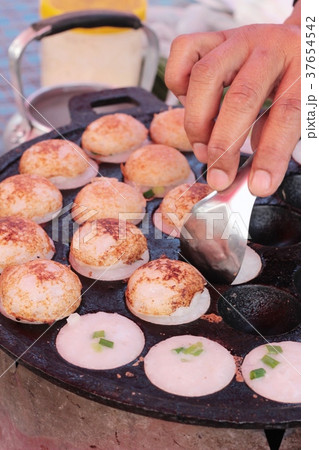 coconut milk mix sugar and flour ,thai dessert. coconut milk mix sugar and flour ,thai dessert. 37654542
