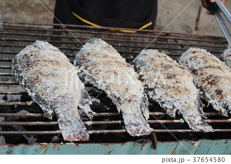 Grilled fish on the stove. 37654580