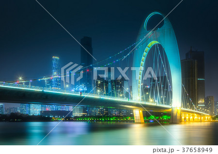Bridge on Zhujiang River and skyline of Guangzhou Bridge on Zhujiang River and skyline of Guangzhou 37658949