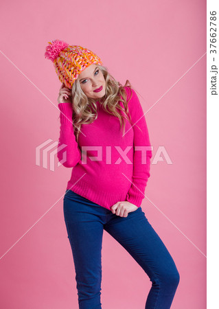 Beautiful young pregnant woman is wearing warm Beautiful young pregnant woman is wearing warm 37662786