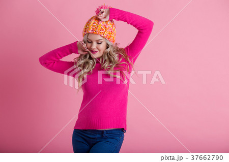 Beautiful happy pregnant woman is wearing warm Beautiful happy pregnant woman is wearing warm 37662790