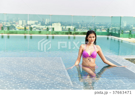 Swimsuit Concept. Beautiful girl wearing pink swimsuit. Beautifu 37663471