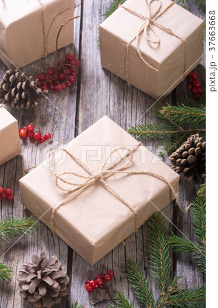 Gifts , viburnum , hazelnut and christmas tree 37663668