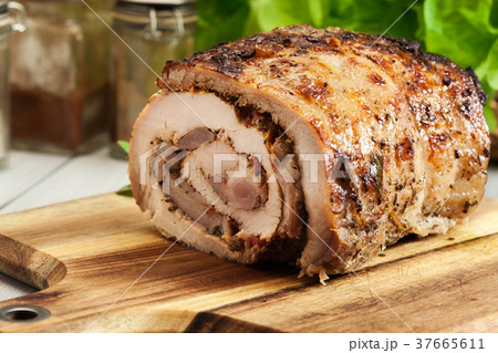 Roasted pork roll stuffed with other meat 37665611
