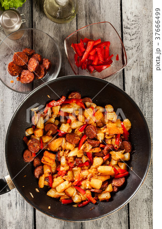 Tortilla de patatas. Cooking spanish omelette Tortilla de patatas. Cooking spanish omelette 37666499