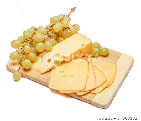 swiss cheese or cheddar and grapes on white 37668982