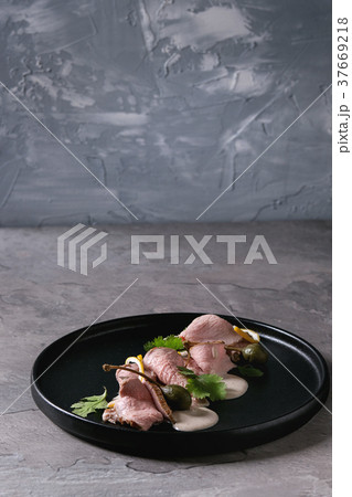 Veal with tuna sauce vitello tonnato 37669218