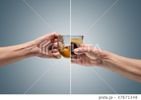 Man holding a cup of coffee Man holding a cup of coffee 37671348