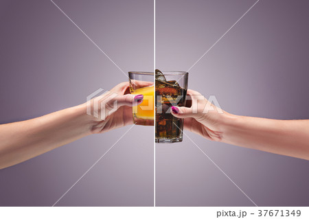 beautiful woman holding orange juice beautiful woman holding orange juice 37671349