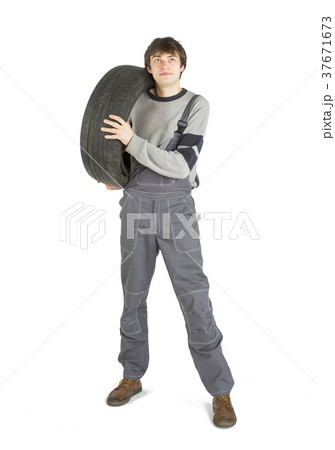 A young brunet foreman in working grey uniform 37671673
