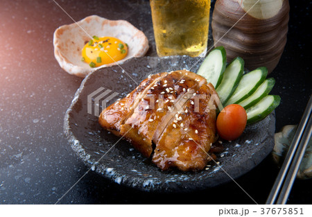 Grilled chicken with teriyaki sauce. Grilled chicken with teriyaki sauce. 37675851