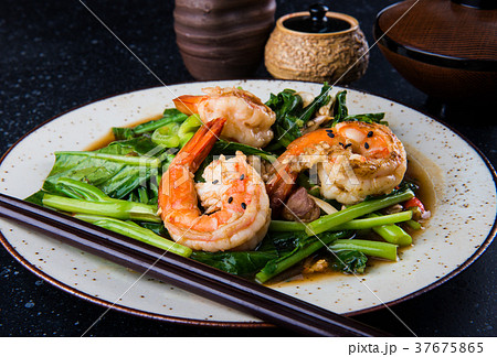 Chinese broccoli fried with shrimps. Chinese broccoli fried with shrimps. 37675865