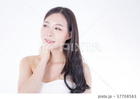 Young beautiful korea woman isolated on white. Young beautiful korea woman isolated on white. 37708563