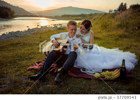Wedding picnic composition on the river bank 37709543