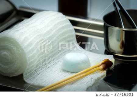 Wound care dressing set on stainless steel plate.  Wound care dressing set on stainless steel plate.  37716901