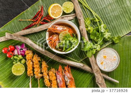 典型的な東南アジア料理 typical Southeast Asian cuisine 典型的な東南アジア料理 typical Southeast Asian cuisine 37716926