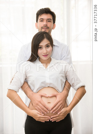 Pregnant Woman and Husband - Family Concept 37717336