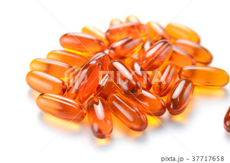 pile of Fish oil capsules on a white background 37717658