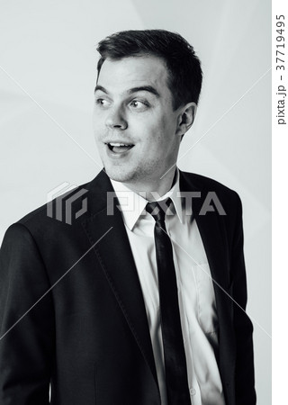 Portrait of handsome stylish man in elegant suit 37719495