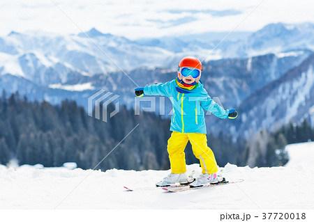 Kids winter snow sport. Children ski Family skiing 37720018