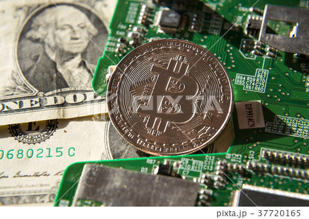 Silver bitcoin with dollars computer motherboard 37720165